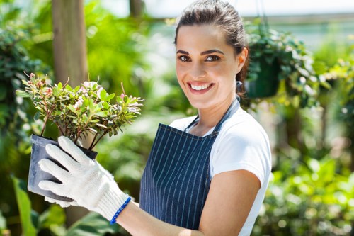 Person reviewing a landscaping complaint with site notes
