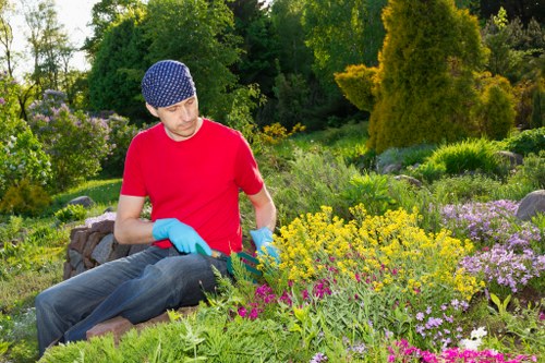 Layered planting and hard landscaping features in a Southfields outdoor space